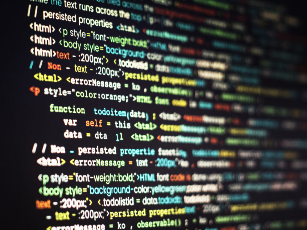 A student learning JavaScript on a laptop with Webliquids branding, highlighting modern web development in 2025.