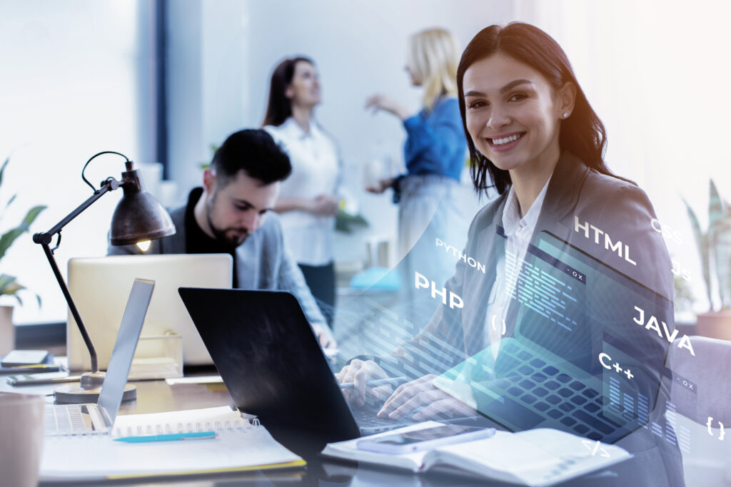 Full stack software developer working with multiple monitors displaying code, databases, and deployment tools, representing a complete modern tech stack.