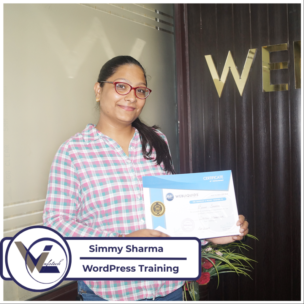 Students practicing responsive web design on laptops